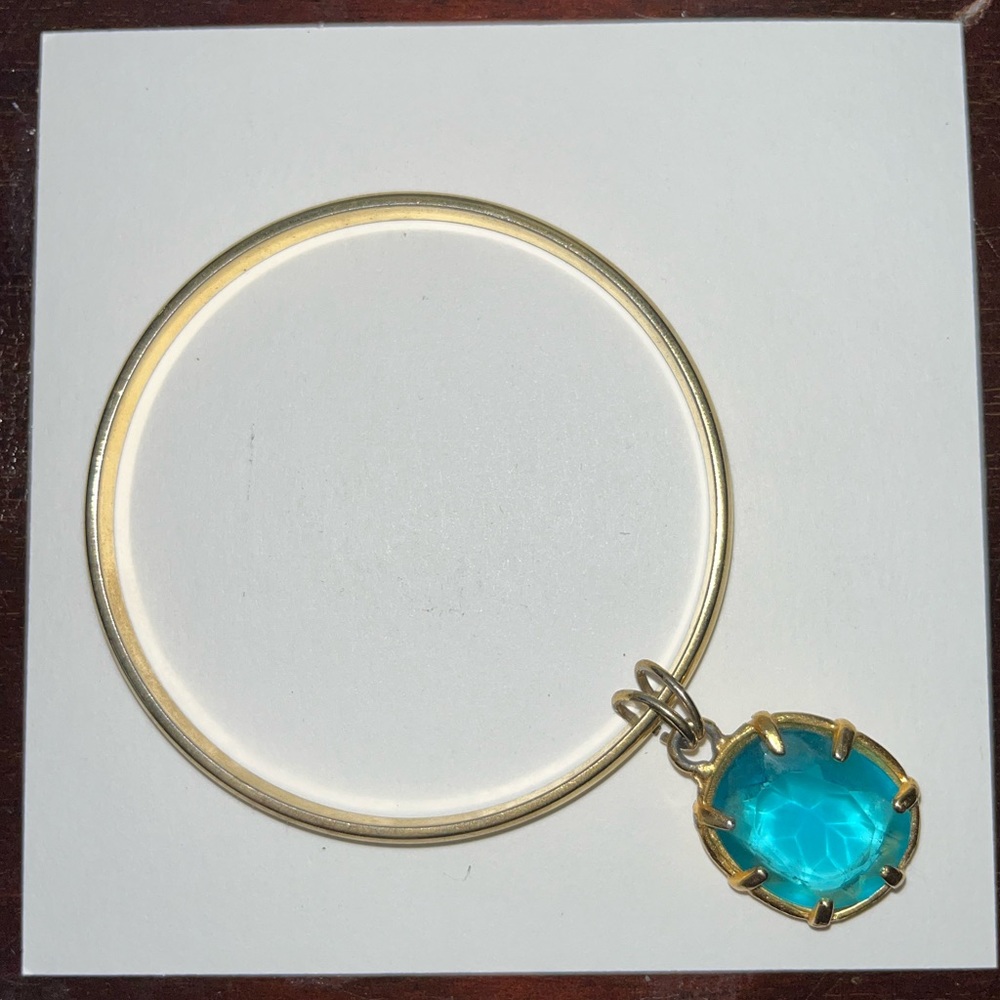 Gold Bracelet with Blue Stone Pendant